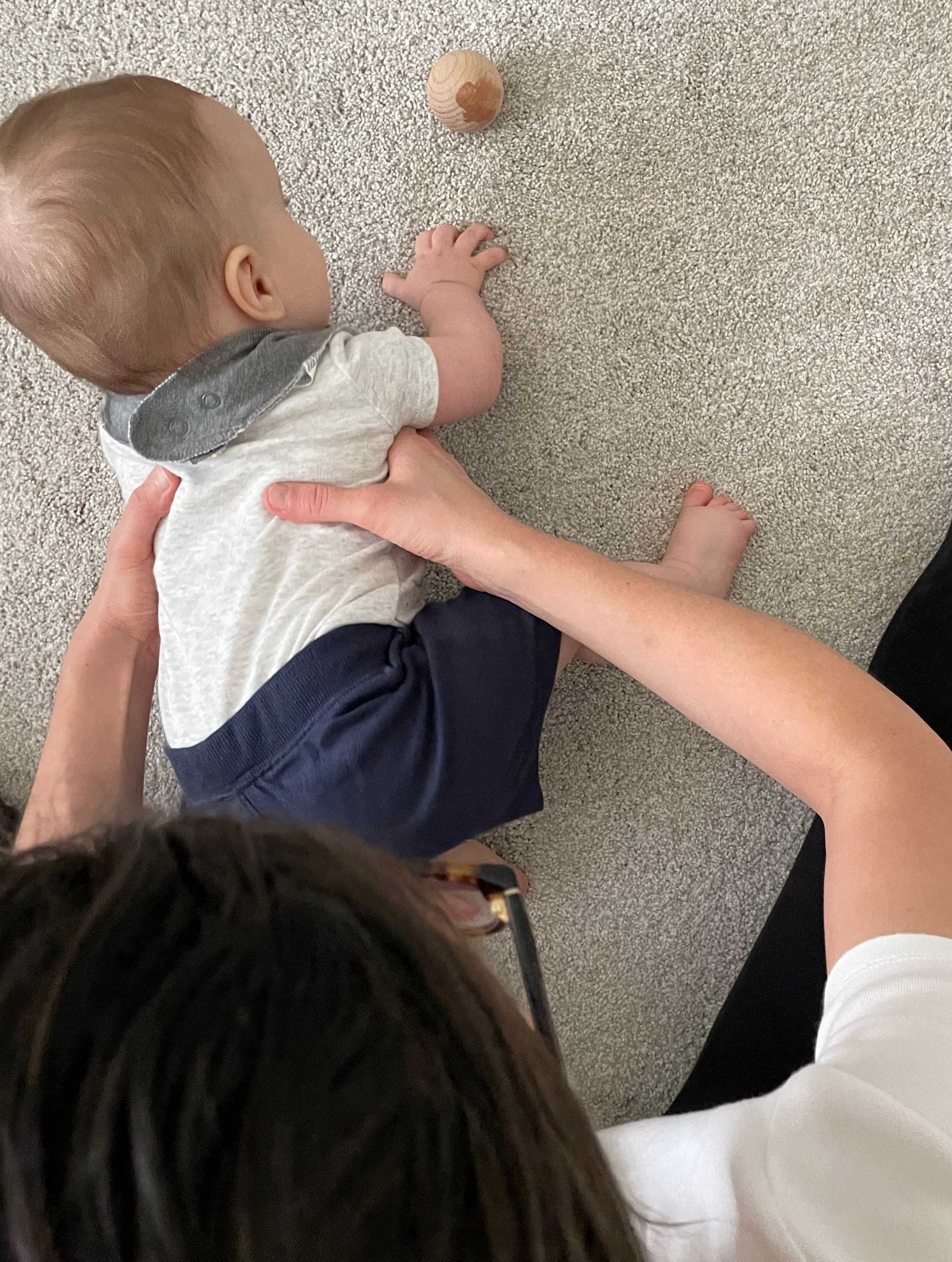 Baby getting into crawling position