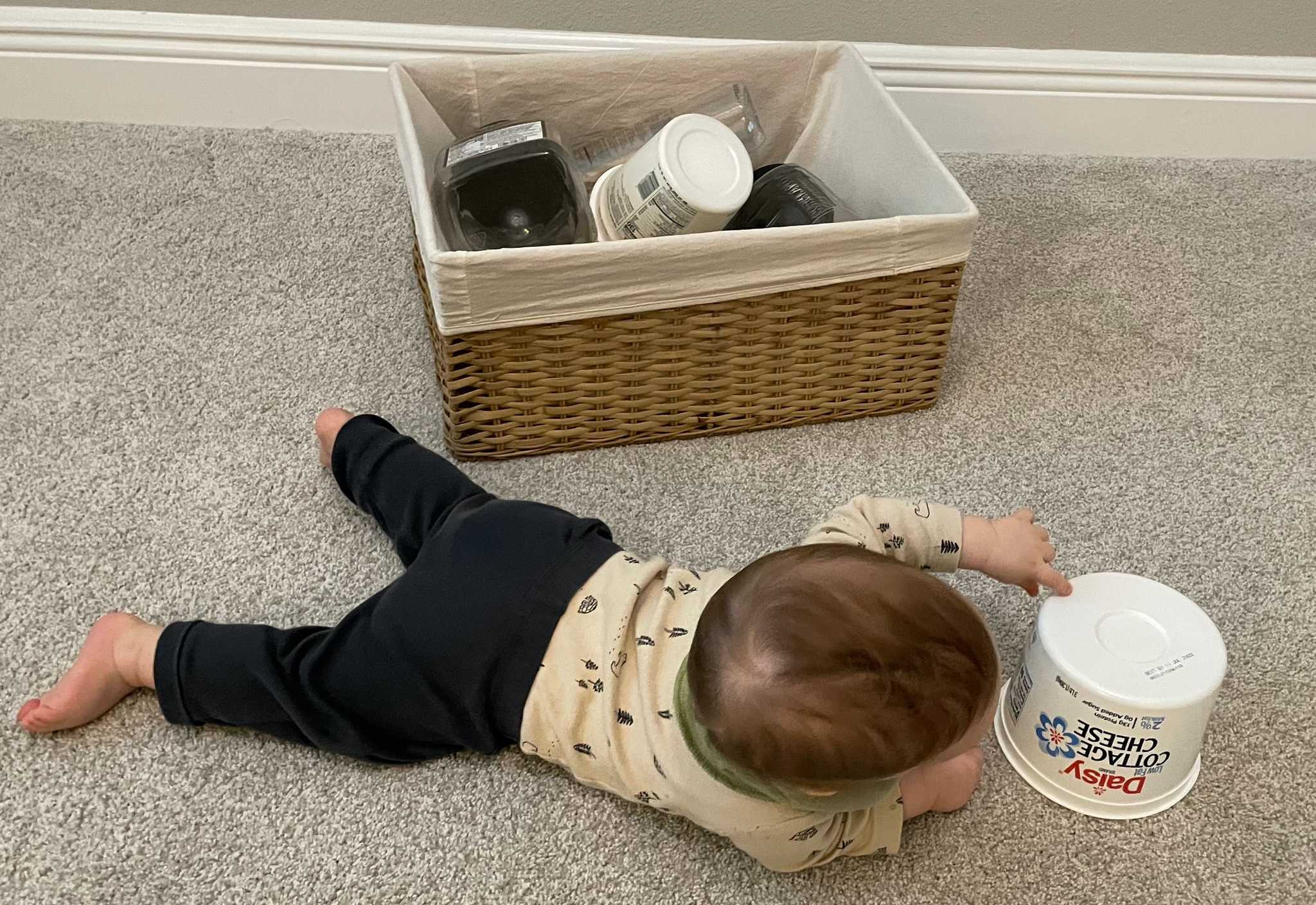 Exploring a basket full of containers - learning babies